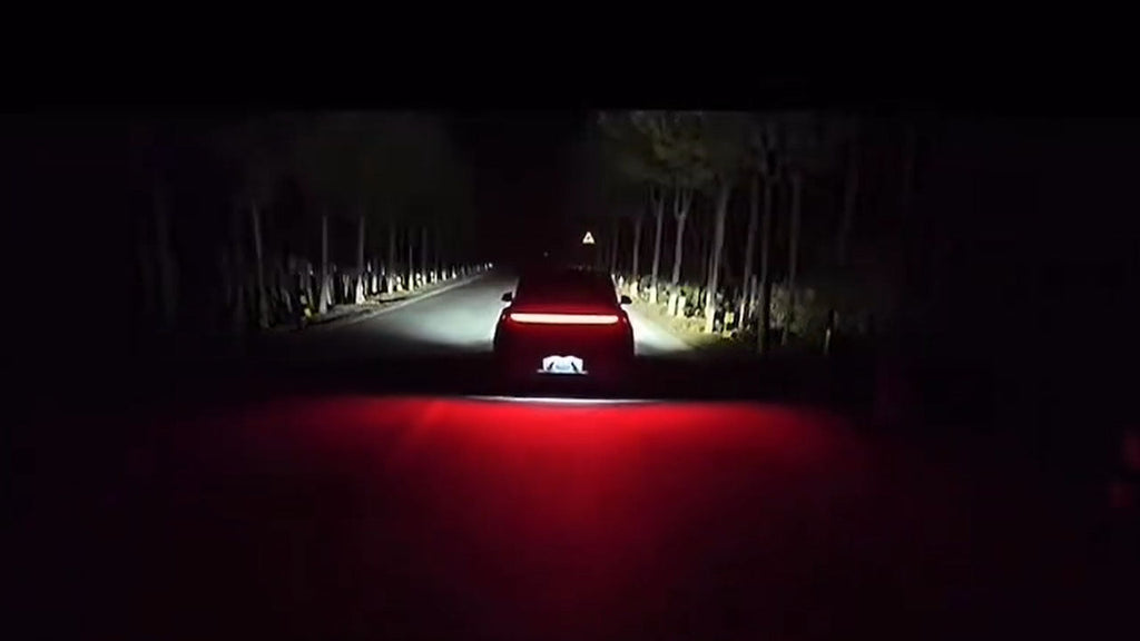Witness the Tesla Model Y rear light bar create a Tesla 'T' in the dark
